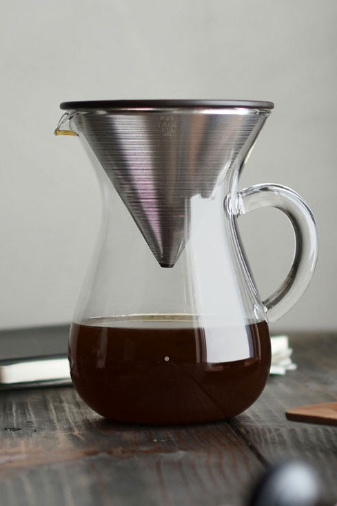 Coffee carafe with stainless pour cone top, clear glass body, side handle