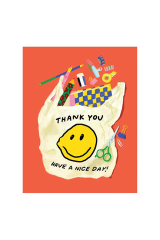 Thank you greeting card showing stationery items spilling out of a bag with a smiley face that reads "thank you have a nice day!"