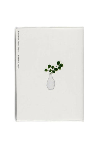 A6 monthly planner back cover with small vase and green plant illustration