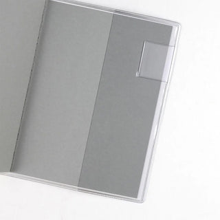 A6 monthly planner interior with clear pocket and flat gray page sections