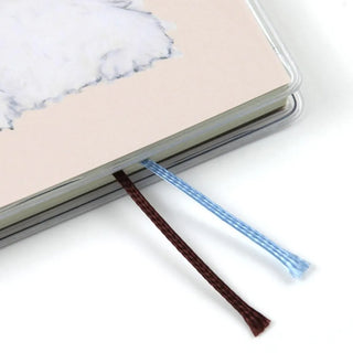 B6 weekly diary with metal rings and blue and brown ribbon bookmarks