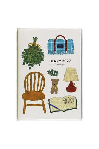 2027 B6 weekly planner with illustrated chair, cat, lamp, book, and diary title cover