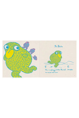 Open book spread with blue-green bird illustration and handwritten-style captions