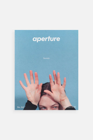 Aperture magazine issue No. 263 with blue cover, hands, and 'Secrets' text