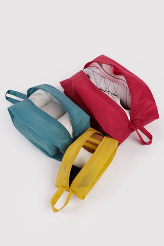 BAGGU 3D zip set of three pouches in teal, red, and yellow with zippers and handles