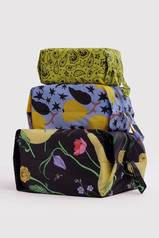 3D zip pouch set of three with olive paisley, star print, and black floral pouches