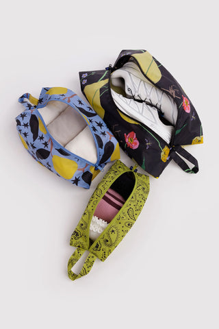 3D zip pouch set, open with light lining; star print, black floral, and olive paisley pouches