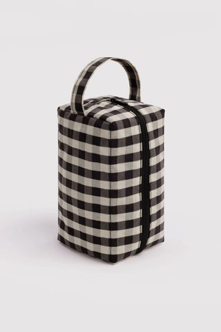 Black and cream gingham toiletry dopp kit with top handle and zip closure