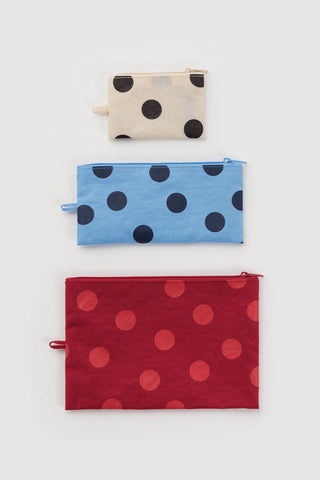 BAGGU polka dot flat pouch set: beige, blue, and red zip pouches