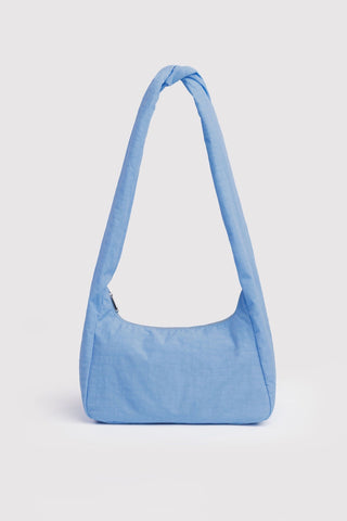 Light blue handbag on a light gray background
