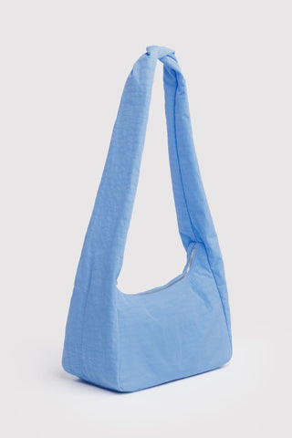 Light blue shoulder bag on a light gray background