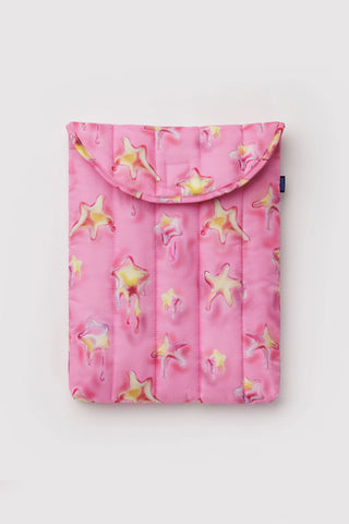 Pink pouch with star pattern on a light gray background