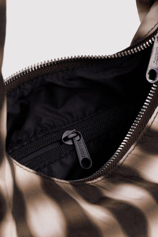 Close-up of a bag with zippers showing interior