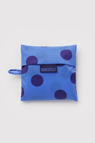 Foldable blue polka dot tote bag pouch with BAGGU label