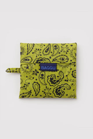 Folded chartreuse paisley tote pouch with BAGGU logo and tie