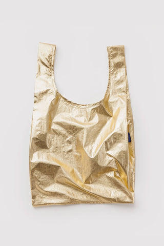 Gold metallic tote bag with wide handles, crinkled fabric