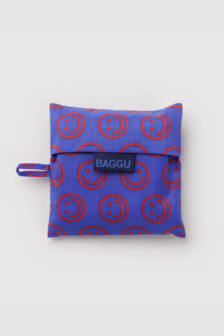 BAGGU mini tote bag folded pouch with drawstring and red smiley circle pattern