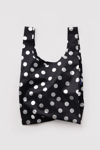 Black standard tote bag with silver polka dots and wide handles