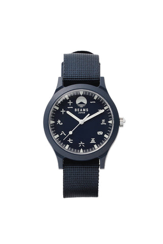 Navy watch with a detailed face on a white background