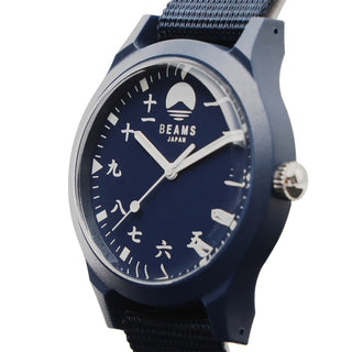 Blue watch with a kanji number on face on a white background