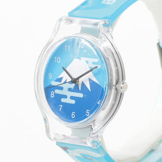 Wristwatch with blue and white mountain design on a white background