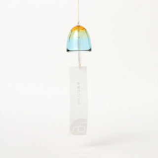 Colorful yellow and blue gradient wind chime with a white background