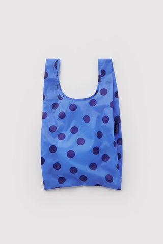 Baby BAGGU reusable tote bag, blue with dark purple polka dots, U-shaped handles
