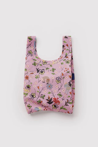 Pink baby BAGGU reusable tote with colorful flower and creature print
