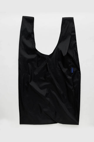 Large BAGGU black reusable tote bag with open top and long handles