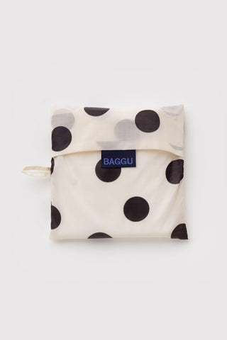 Cream and black polka dot BAGGU tote bag pouch with BAGGU logo label