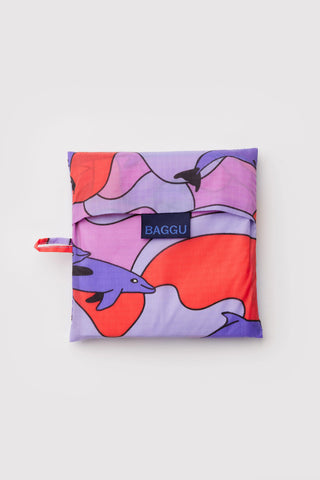 Colorful reusable bag with dolphin design on a white background