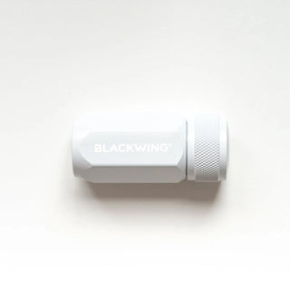 White pencil sharpener with 'BLACKWING' branding on a white background