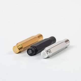 Three blackwing point guards, gold, black, and silver, on a white background