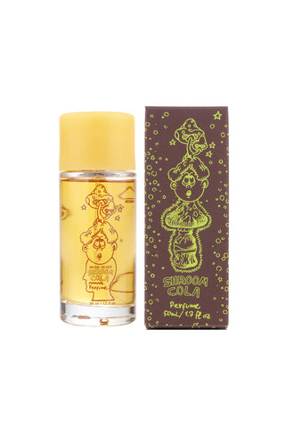 Perfume bottle next to its packaging on a white background