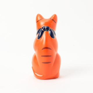 Orange cat-shaped figurine with stripes and a collar on a white background