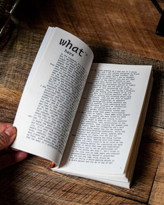 Open book spread with heading “what” and multi-paragraph text