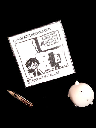 Candy Apple Comics branding with drawing of person at the computer