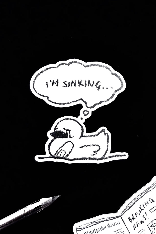 Vinyl sticker with cartoon character lying down and speech bubble reading “I'm Sinking...”
