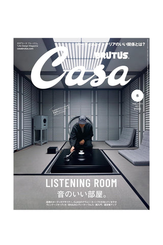 Cover of Casa magazine featuring a listening room with a person sitting