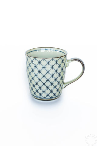 Celadon lattice 8 oz ceramic mug, cream with dark blue star lattice pattern