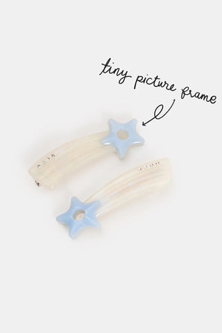Star-shaped light blue hair clips with clear rhinestone detail