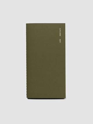 Travel notebook with olive green cover and vertical logo text