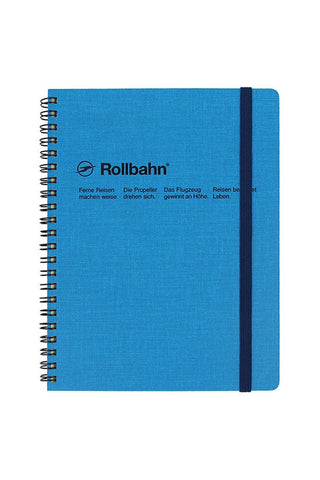 A5 spiral notebook, cap-martin blue cover with Rollbahn logo and black spine band