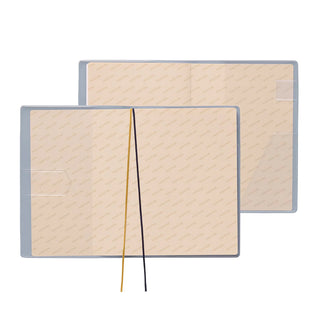 Interior of planner to show features with ribbon bookmarks, pen loop, and corner pocket for small items