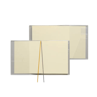 Interior of planner to show features including ribbon bookmarks, pen loop, and corner pocket for small items