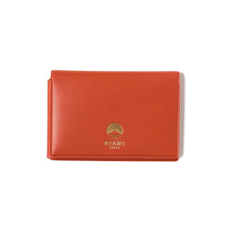 Red card case with the Beams Japan logo on a white background