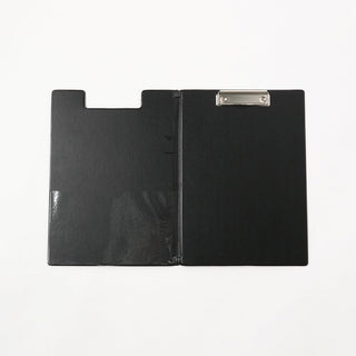 Opened black clipboard on a white background