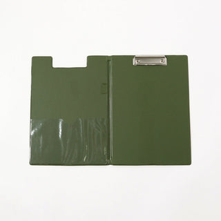 Opened green clipboard on a white background