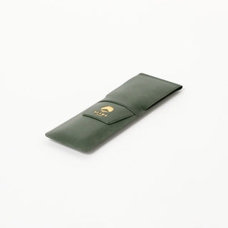 Side angle of green pen case with Beams Japan logo on a white background