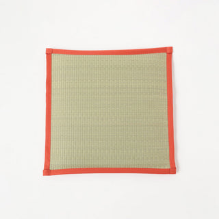 Square mat with a orange border on a white background
